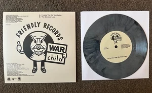 PJ HARVEY live at L'Olympia Paris WAR CHILD 7” GREY vinyl - Friendly Records - Picture 1 of 2