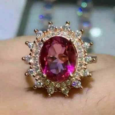 Anillo de boda con halo de zafiro rosa creado en laboratorio de corte ovalado de 3 quilates enchapado en oro amarillo de 14 quilates Foto 1 de 4