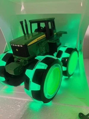 John Deere Toy Tractor with Huge 4X4 Wheels by ERTL & Tomy M Lights - Image 1 of 4
