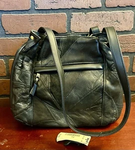 Cartera de colección Montgomery Ward de cuero con retazos grunge negra con etiquetas - Imagen 1 de 17