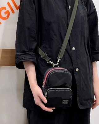 MINI MOCHILA TIRACOLO PORTER Japão preta nylon HOWL WOODLAND CAMO DAYPACK - Imagem 1 de 4