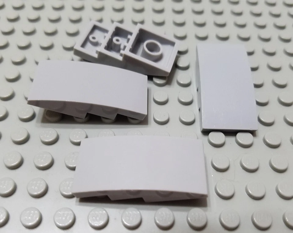 LEGO Lot of 4 Light Bluish Gray 4x2 Curved Slope Pieces - Image 1 of 1