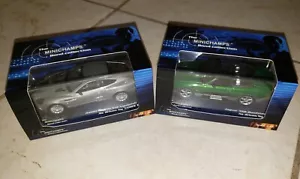 Minichamps 1:43 James Bond 007 Aston Martin Vanquish and Jag XKR NEW. - Picture 1 of 8