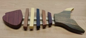 Fischförmiger Holzuntersetzer Handarbeit - hitzebeständiges Pad - Untersetzer aus Belize  - Bild 1 von 4