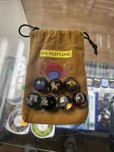 Pokémon Murmeln Lot mit Vileplume Tasche - 7 Pokémon Murmeln - Bild 1 von 1