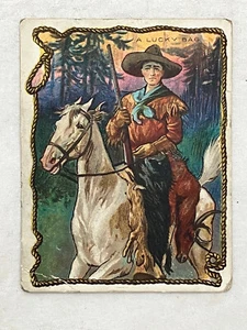 Circa 1909 Trade Card "A LUCKY BAG" Hassan Cigarettes Cowboy, White Horse Series - Picture 1 of 5