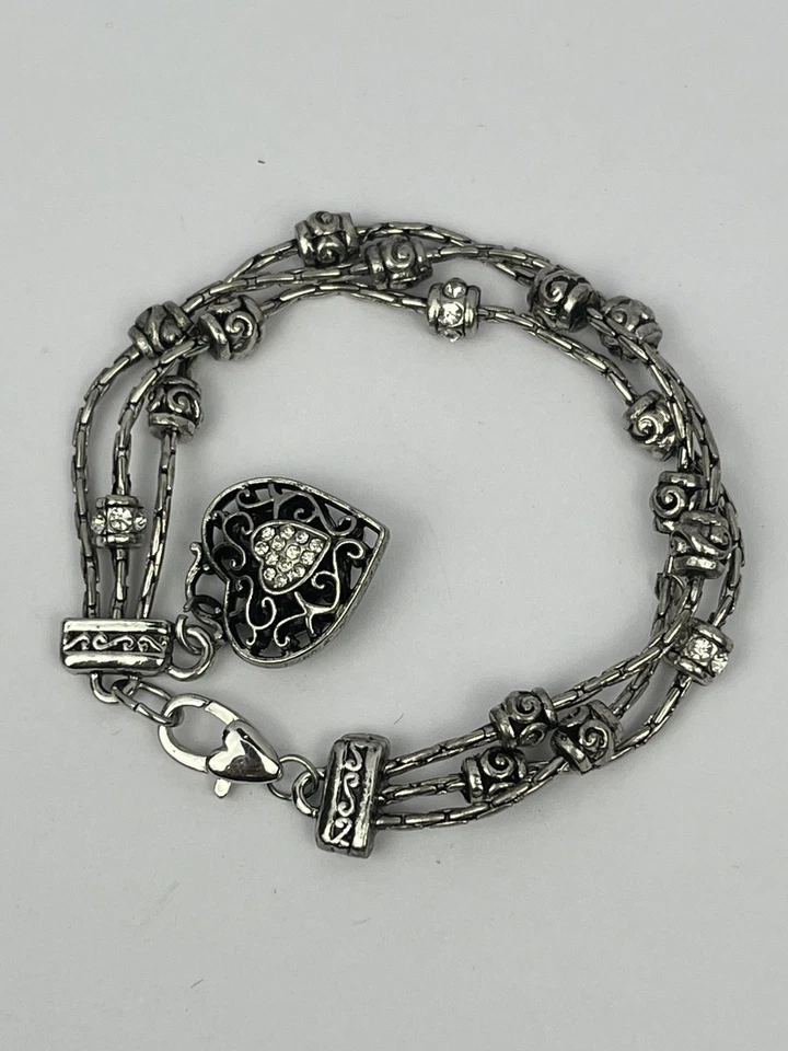 Pulsera estilo vintage con dije de corazón de triple hilo - tono plata, detalles de cristal Foto 1 de 4
