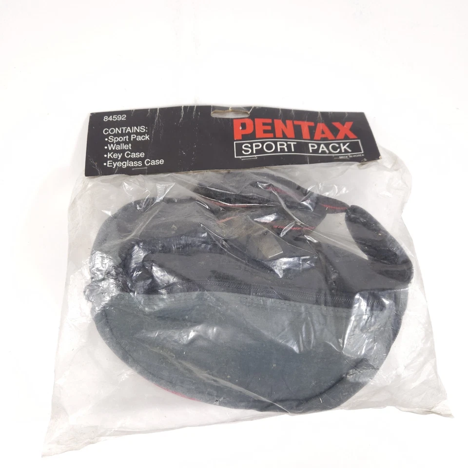 Paquete deportivo Pentax de colección con estuche para llaves billetera estuche para gafas nuevo sellado 84592 Foto 1 de 2