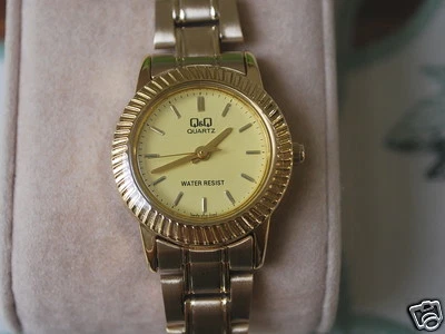 New Q&Q by Citizen Gold Tone Lady Dress Watch w/Fancy Bezel - Image 1 of 4