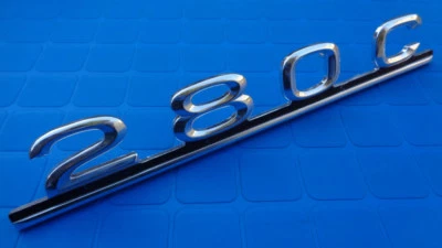 Mercedes Benz W123 280C tapa maletero emblema designación guión tapa trasera OEM NOS Foto 1 de 4