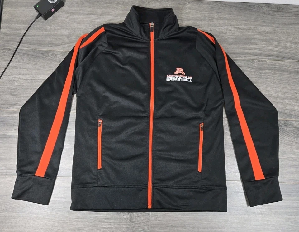 Chaqueta de baloncesto Mediapolis para dama mediana negra holloway corta con cremallera Foto 1 de 4