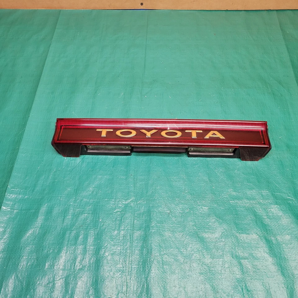 Toyota Previa 1991-1997 puerta levadiza manija moldura placa placa luces OEM 81276-28010 Foto 1 de 4