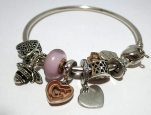 AUTENTICO BRACCIALE CIONDOLO PANDORA ALE ARGENTO CON 7 CIONDOLI (G123047-1 26,3 grammi) - Foto 1 di 7