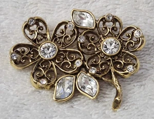 Bonito broche broche floral con pedrería de cristal dorado y facetado - Imagen 1 de 4