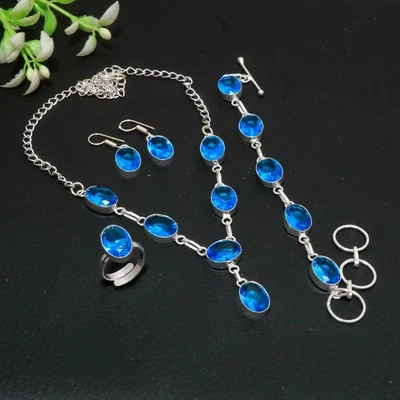 Juego de joyas hechas a mano con piedras preciosas ovaladas de plata de ley 925 con topacio azul de Londres AAB 199 Foto 1 de 4