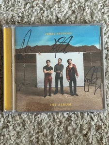 Jonas Brothers - The Album: HAND SIGNED AUTOGRAPH Album CD Nick Joe Kevin SEALED - Picture 1 of 1