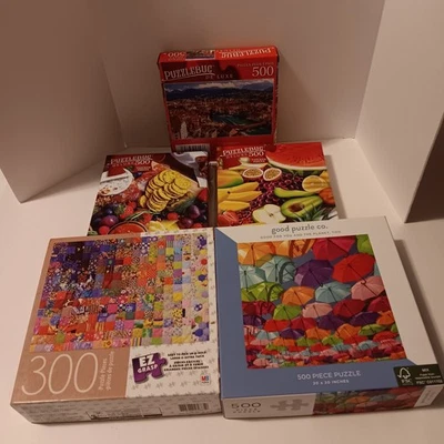 Lot of 5 puzzles, some still in plastic, see photos for item detail - Image 1 of 4