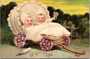 Gift of Love Vintage Valentine Postcard Babies in Cart Flower Wheels c1908 - Picture 1 of 3