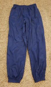 Nike Youth Boy's Size L 14/16 Nylon Athletic Pants Blue Pockets Zip Ankle Logo