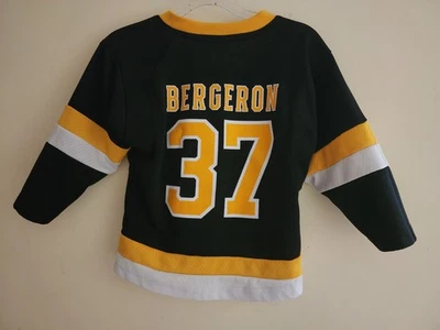 ДЕТСКАЯ ХОККЕЙНАЯ ФУТБОЛКА BOSTON BRUINS PATRICE BERGERON 2T-4T - Изображение 1 из 3