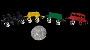 Vintage miniature 4 Die cast train cars Japan black yellow green red - Picture 1 of 11