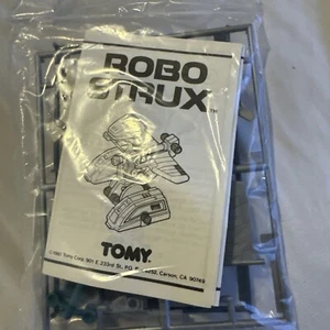 Dinosaur robot Tomy Robo Strux Special Edition Zoids NOS sealed in baggie - Picture 1 of 3