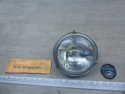 1981 Suzuki GS450T S20955) Koito headlight head light lamp w/ trim for parts  - Image 1 of 4