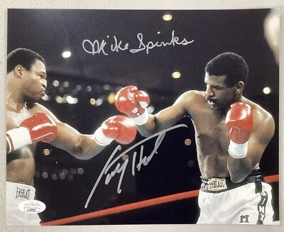 Foto assinada por Larry Holmes 8x10 vs Michael Spinks autógrafo campeões de boxe JSA - Imagem 1 de 4