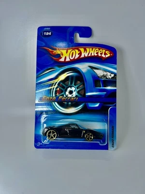 2006 Hot Wheels Ferrari Enzo Black w/ Gold o5 Wheels Collector Number 194 New - Image 1 of 4