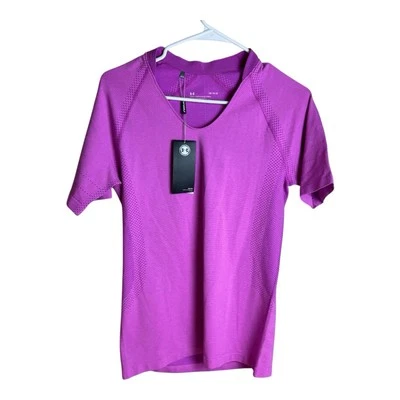 Camisa deportiva Under Armour para mujer rosa ajustada sin costuras manga corta talla grande Foto 1 de 4