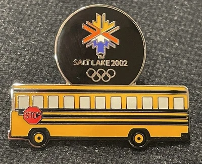 Autobús escolar amarillo con prendedor de los Juegos Olímpicos de Salt Lake City Utah 2002 Foto 1 de 2
