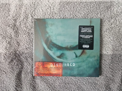 Disturbed 2025 "The Sickness [25th Anniversary Deluxe Edition] (2 CD) - Bild 1 von 2