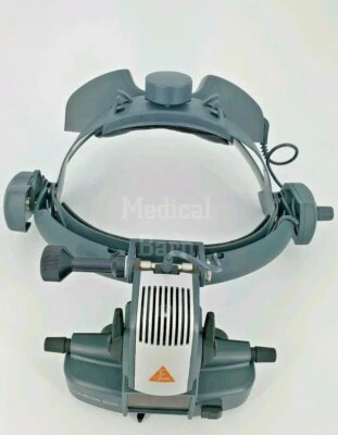 Oftalmoscopio indirecto binocular inalámbrico Heine Omega 500 desenchufado con cargador Foto 1 de 4