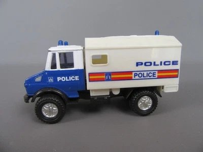 C504 Cararama Mercedes-Benz Unimog 1400 Furgone 1996 POLIZIA 1:43 - Immagine 1 di 4