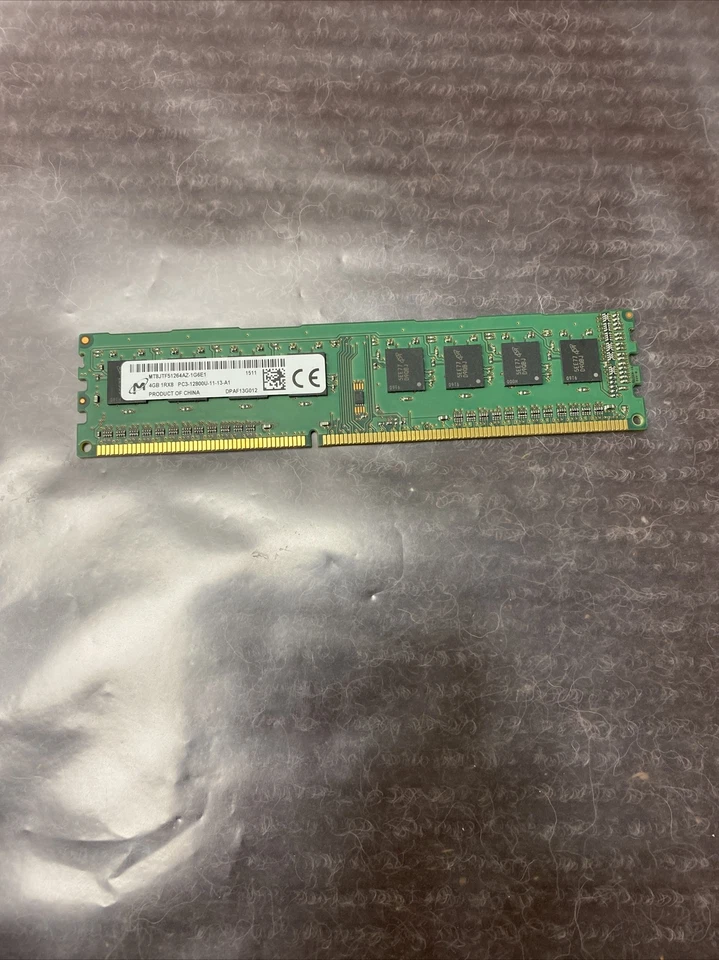 Micron MT8JTF51264AZ-1G6E1 DDR3 PC3-12800U 4GB 1Rx8 DPAE38Z038 - Image 1 of 3