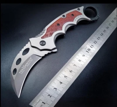 Navaja de Bolsillo Plegable Garra Karambit Táctica con Mango Estilo Madera Foto 1 de 4