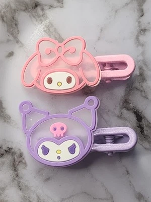 Pinzas para el cabello Hello Kitty Kuromi 2 piezas nuevas rosa púrpura Foto 1 de 4