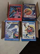 Lot of 24 new Intellevision games in their packaging box.