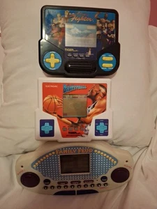Vintage Tiger Electronics Hand Held Games Sega, Basketball, & Family Feud - Picture 1 of 7