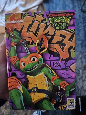 SDCC 2023 TMNT Mutant Mayhem Nickelodeon Exclusive Michelangelo Ninja Turtle Toy Cover