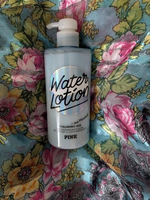 Loción de agua ROSA ácido hialurónico y minerales marinos loción corporal reponedora 14 oz Foto 1 de 2