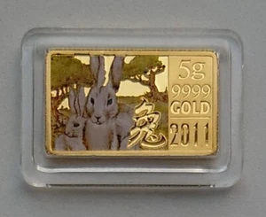 2011 Cook Islands 10 $ THE YEAR OF THE RABBIT 5 g Proof Rectangular Gold Coin - Picture 1 of 8