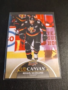 2021-22 Upper Deck Series 1 - UD Canvas Black #C11 Mikael Backlund - Picture 1 of 2