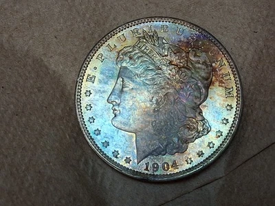 Dólar de plata Morgan 1904-O gema sin circular con tonificación-brillante brillo ilumina colores Foto 1 de 4