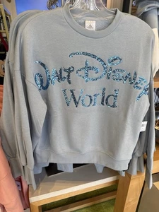 Maglione Disney Parks 2025 WDW blu glitter taglia grande nuovo - Foto 1 di 2