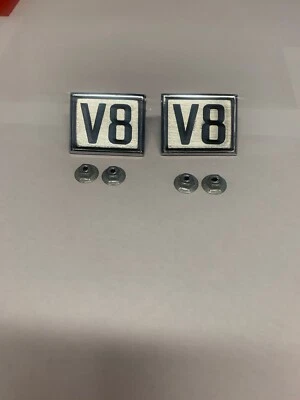 65 66  Pontiac Beaumont Canso Fender V-8 Emblems Pair # 5737239.  Free Shipping - Image 1 of 2
