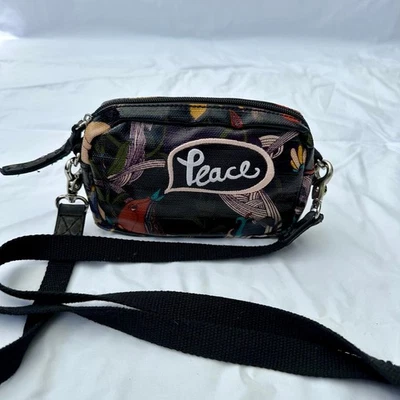 Mini bolso bandolera Sakroots Black River Peace Birds Foto 1 de 4