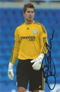 PETERBOROUGH: STEVE COLLIS SIGNED 6x4 ACTION PHOTO+COA - Picture 1 of 1
