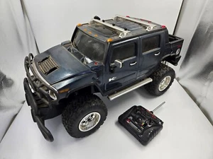 New Bright Hummer H2 9.6v RC Truck with Remote - Tested - Picture 1 of 8