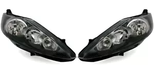 Scheinwerfer Set links + rechts für Ford Fiesta MK7 in Schwarz + LWR Motor - Bild 1 von 4
